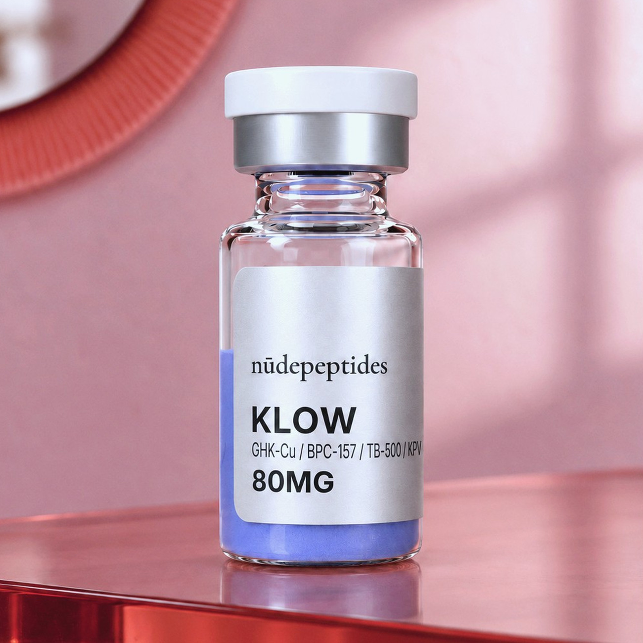 KLOW 80mg vial on a red acrylic shelf in a pink room